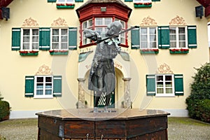 Sculpture of young Mozart playing the violin in front of the Town Hall. Village Sankt Gilgen, Austria.