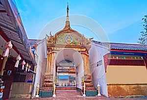 The sculptured gate of Wat Saenfang, Chiang Mai, Thailand
