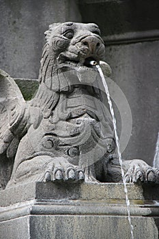 A sculptured hybrid animal decorates a fountain (France) photo