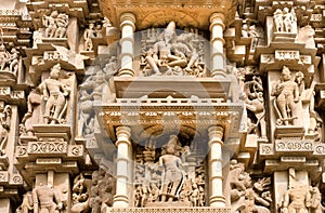 Sculptured surface of famous indian temple of Khajuraho with Hindu gods. UNESCO Heritage site