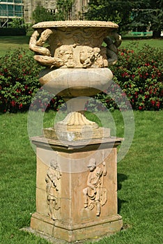 Sculptured urn in a garden