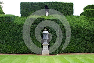 Sculptured urn and hedge, Sudeley castle, England