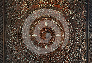 Sculptured wood circle decorative spiritual symbol of lotus flow photo