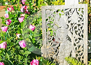 Sculptured wood and flowers