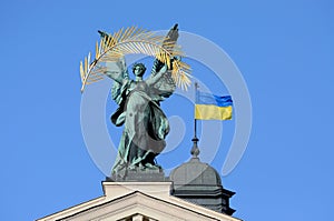 Sculptures adorn front of Solomiya Krushelnytska Lviv State Academic Opera and Ballet Theatre. photo