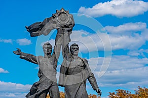 Sculptures around the friendship of the nations arch in Kiev, Ukraine