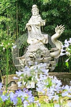 Sculptures of Chinese gods. (Kuan Yin) in the park.