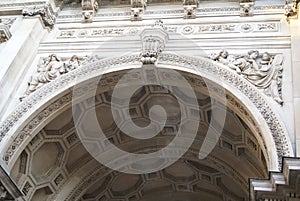 Sculptures on entrance archway to Burlington House facing Piccadilly in London, England, Europe