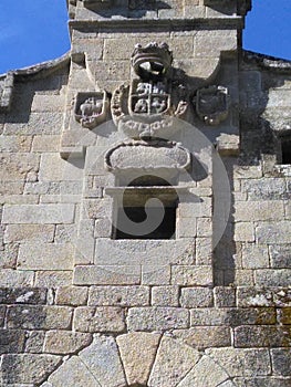 Sculptures on the facade of the church of San Juan de Caaveiro, Puentedeume, La CoruÃ±a, Spain, Europe