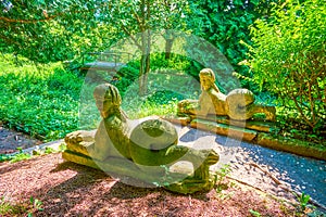 The sculptures of mermaids in landscape garden of Olesko Castle, Ukraine