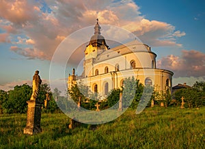 Sculptures on the old abandoned cemetery and baroque Holy Trinity Church in Mykulyntsi, Ternopil region, Ukraine