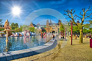 Sculptures in water near Rijksmuseum Amsterdam museum in Holland