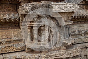 Scultpures carved  at Stone chariot vitala temple main attraction at hampi, karnataka, india photo