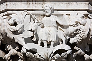 Sculture of saint mark on his donkey photo