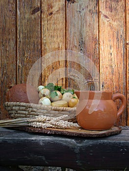 Scuttle of bread and jug