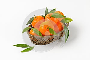 Scuttle of ripe tangerines