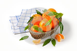 Scuttle of ripe tangerines