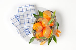 Scuttle of ripe tangerines