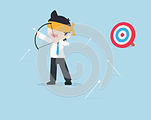 SD Business Man Being blindfolded and the arrow misses the target because of being invisible