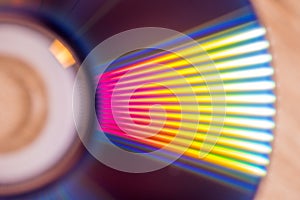 sd and dvd disks on a dark background. large stack