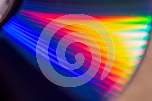 sd and dvd disks on a dark background. large stack