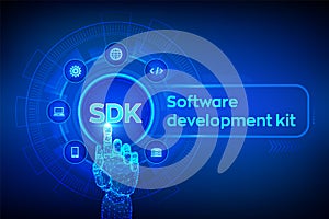 SDK. Software development kit programming language technology concept on virtual screen. Technology Concept. Robotic hand touching