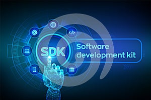 SDK. Software development kit programming language technology concept on virtual screen. Technology Concept. Robotic hand touching
