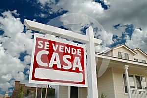 Se Vende Casa Spanish Real Estate Sign and House photo