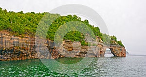 Sea Arch on Colorful Cliffs