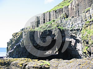 Sea arch near Carsaig, Mull photo