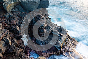 Sea Arches Along The Rugged Volcanic Shoreline