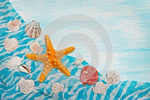 Sea background with blue wood, starfish, shells
