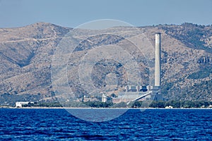 Sea on a background of mountains and blue sky