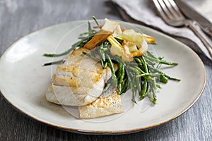 Sea bass fillet with parsnip crisps photo