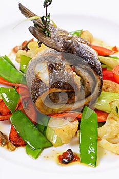 Sea bass fillet with spring vegetables