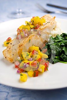 Sea bass with mango salsa