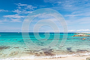 Sea beach in Great stirrup cay, Bahamas on sunny day. Seascape with turquoise water on blue sky. Summer vacation on caribbean isla