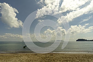 The sea and the beach at noon. The bright sky, the clouds are white.Ã¢â‚¬â€¹Sea atmosphere at Sairee Beach, Chumphon Province