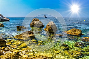 Sea beach with stones and rocks, Beausoleil, Nice, Nizza, Alpes-Maritimes, Provence-Alpes-Cote d\'Azur, Cote d\'Azur,