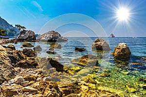 Sea beach with stones and rocks, Beausoleil, Nice, Nizza, Alpes-Maritimes, Provence-Alpes-Cote d\'Azur, Cote d\'Azur,