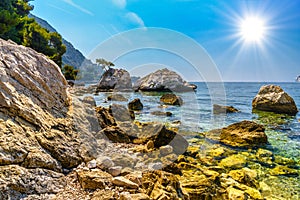 Sea beach with stones and rocks, Beausoleil, Nice, Nizza, Alpes-Maritimes, Provence-Alpes-Cote d\'Azur, Cote d\'Azur,