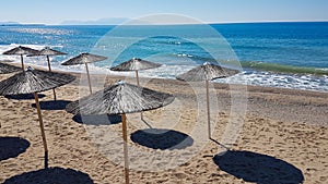 Sea beach umbrellas in preveza kanali greece