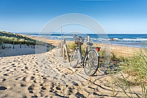 Sea beach view dunes. Sunset sea sand beach landscape. Velo. Background summer sky. Top view. Natural background. Scenic photo