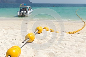 Sea beach with yellow buoys, Safety Swimming zone.