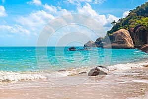 Sea beautiful landscape. Azure sea and rocky shore on a tropical island on a sunny day. Wallpaper, vacation and travel