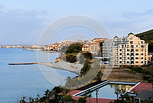 Sea beautiful landscape sunset blue sky empty beach swimming pool buildings background