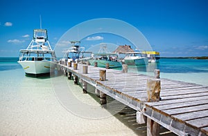 Sea boats at the Contoy island in the Caribbean sea photo