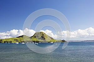 Sea, boats and hill