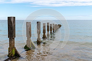 Sea breakwater breaking the waves ocean atlantic in Ile de Noirmoutier France Vendee