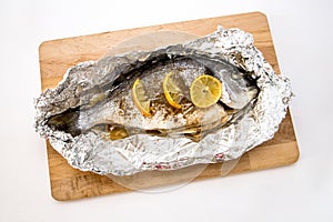 Sea bream baked in aluminium foil